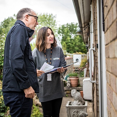 Gavin Cansfield, chief executive and Anita Khan, director of customer services talking with residents in Ashwell