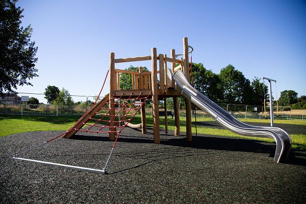 A slide and climbing apparatuses at the Swinburne playground 