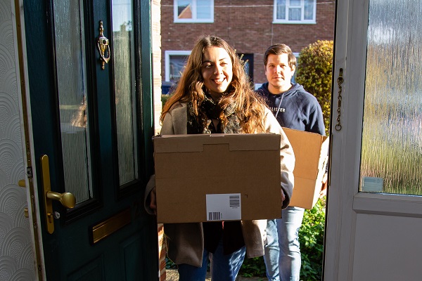 A couple moving into a settle home