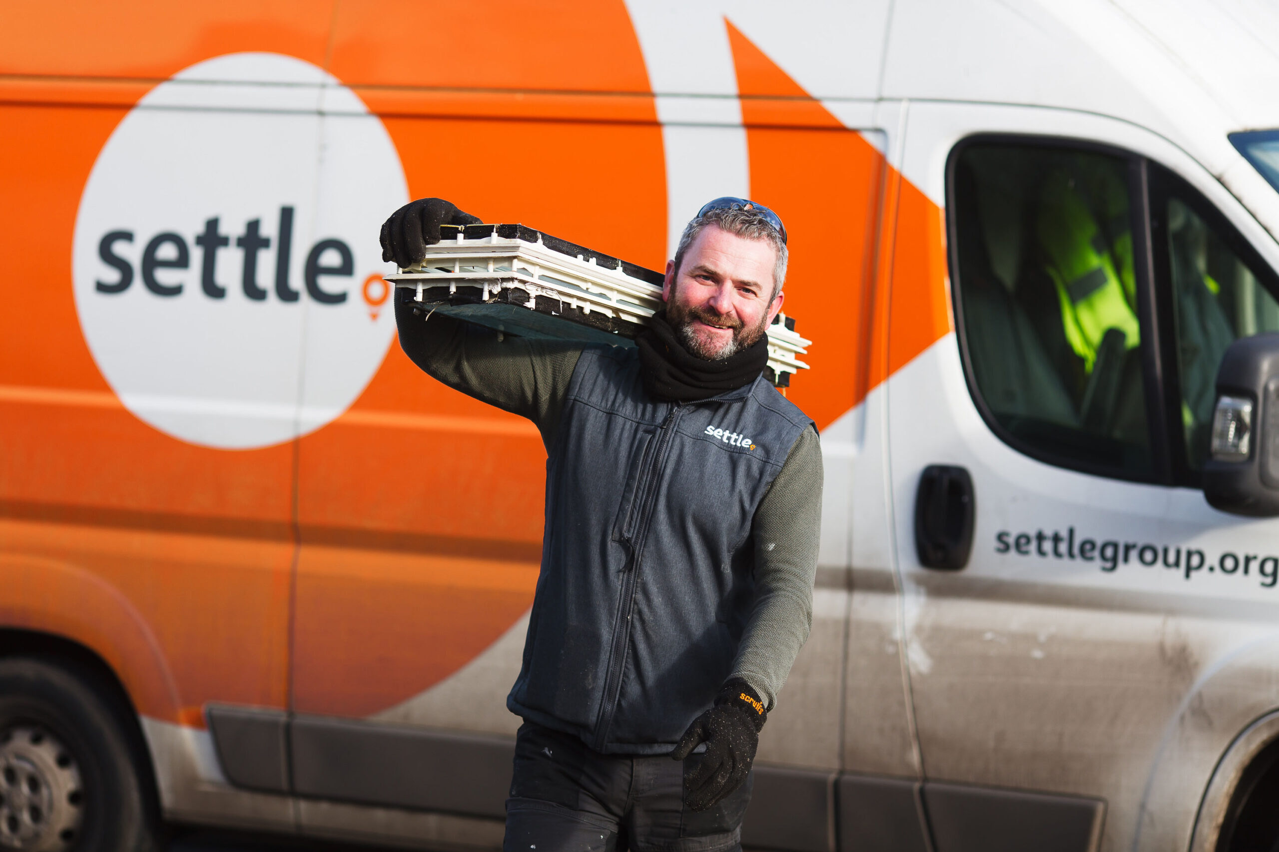 Settle repair person and Settle van. 
