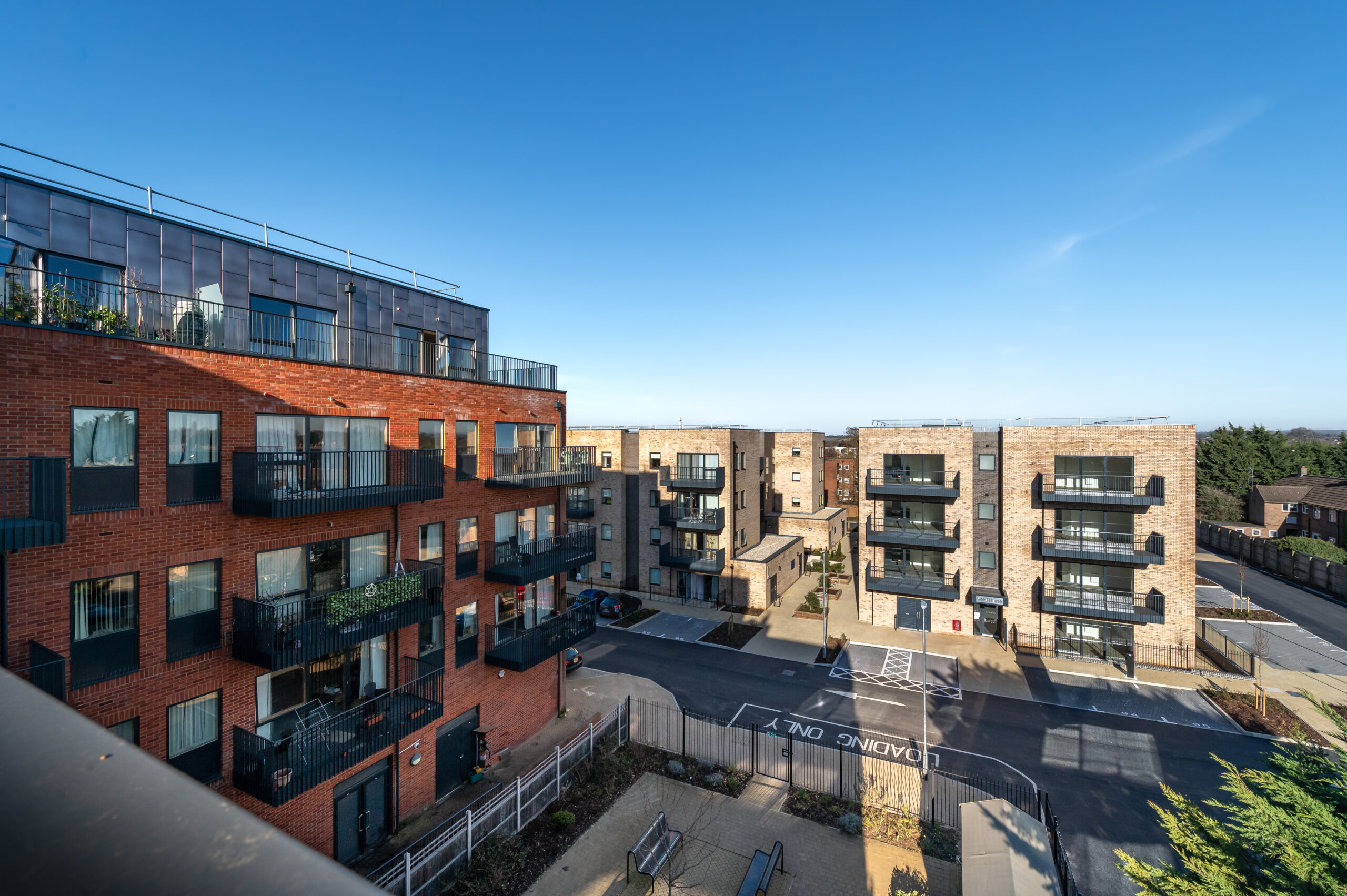 Modern apartment buildings with balconies in John Barker Place, Westmill, Hitchin.
