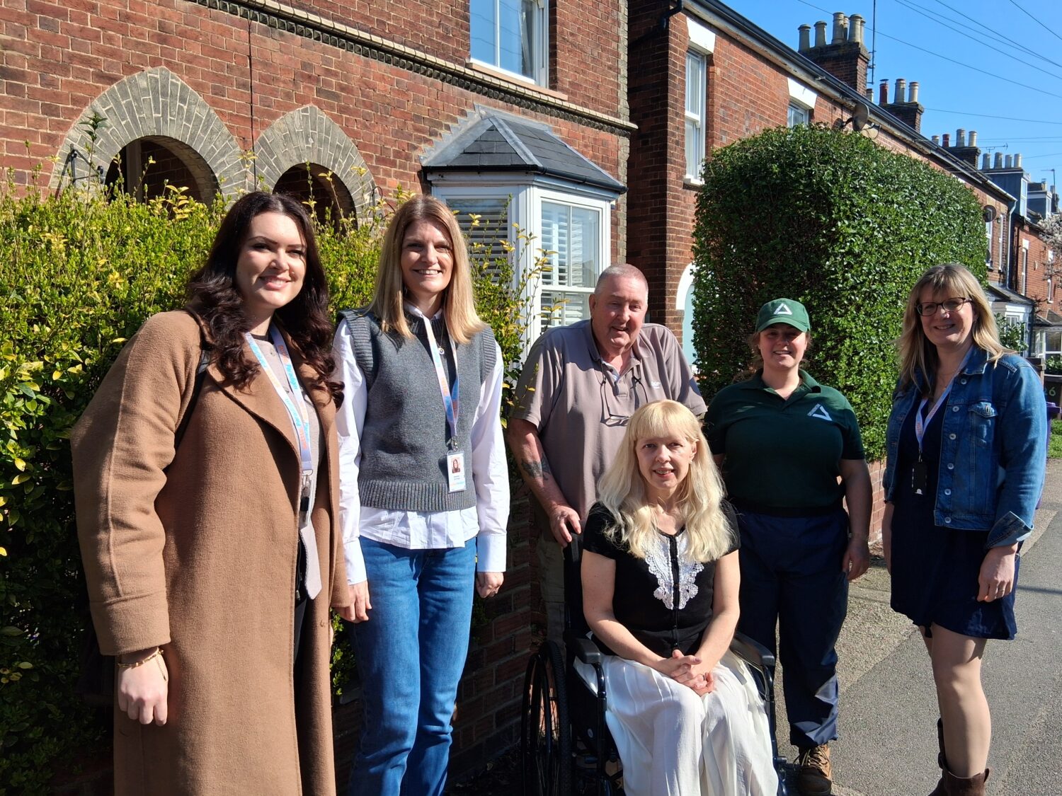 Settle colleagues with Groundwork East volunteers and Settle residents outside a home on the launch day of the Green Aiders project.